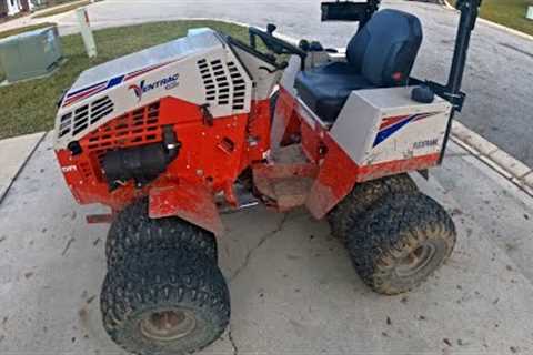 Pressure Washing Muddy Tractor