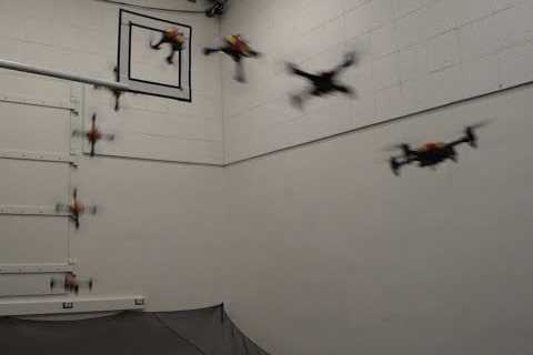 Design and Control of a Passively Morphing Quadcopter